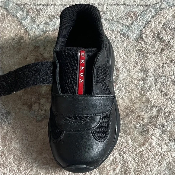 Prada Toddler Black Sneakers with Red Accents - Picture 3 of 5